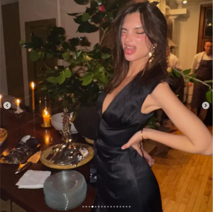 The mother-of-one struck a playful pose next to a table set with dishes and silverware, ready for a delicious meal in another snap.