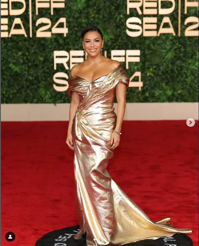 She turned heads at the Red Sea International Film Festival in her stunning off-the-shoulder metallic gown. Her dress was the talk of the event and showcased her timeless beauty and impeccable style.