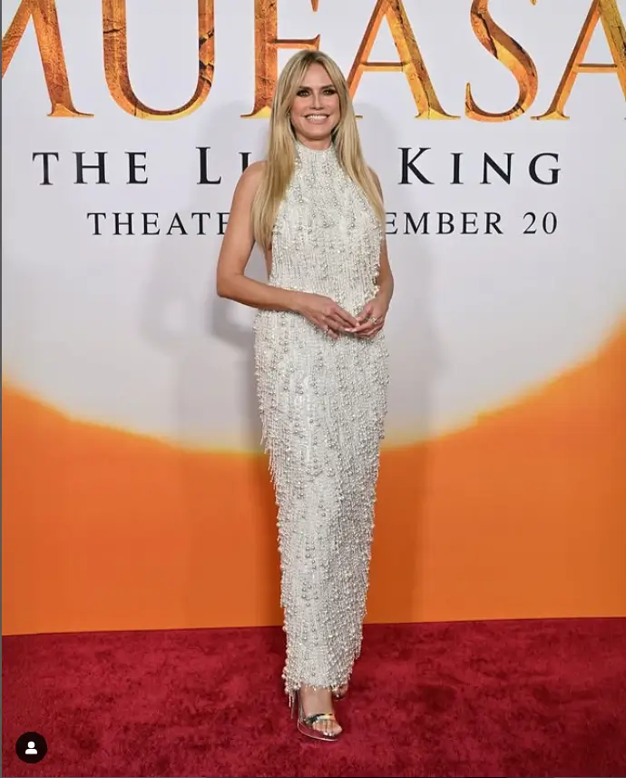 Heidi Klum graced the star-studded Mufasa movie premiere with her ageless and stunning figure dressed in a beautiful pearl dripping dress, proving her timeless beauty. Her appearance was truly sensational and turned heads as she walked the red carpet.