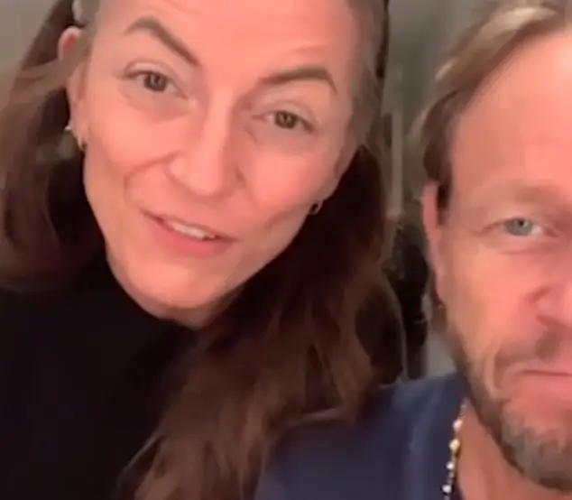 In a fun clip, Davina McCall proudly displays her new haircut after receiving a loving trim from her stylist boyfriend Michael Douglas