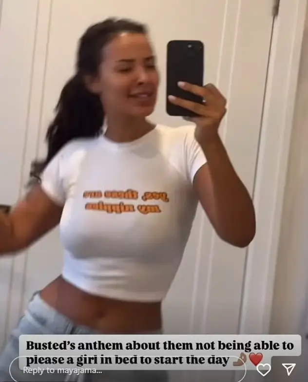 Maya Jama shows off her jaw-dropping curves while wearing a tight white crop top and dancing to the tune of Busted in a comical video