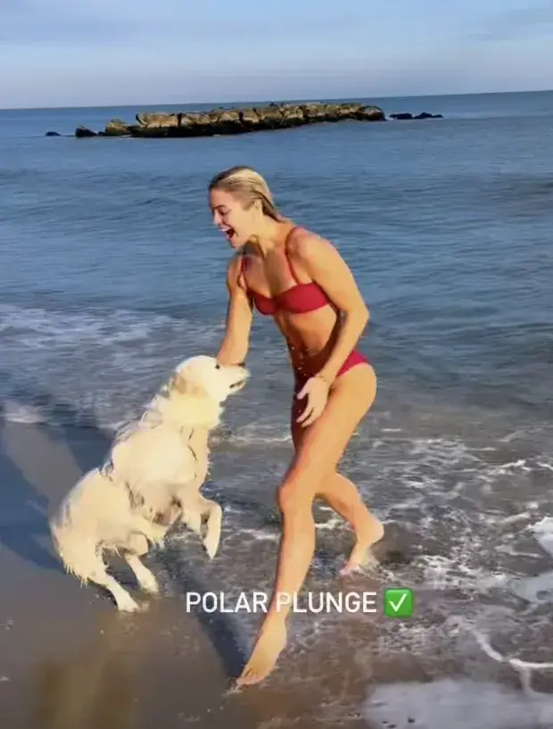 Along with their beloved dog Roux, the couple made their way to Belmar Beach in New Jersey for a Christmas Day dip in the ocean.