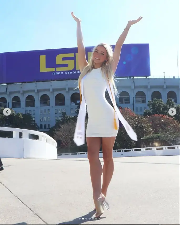 Olivia Dunne wowed her fans with breathtaking images wearing a figure-hugging white dress while she graduates from LSU