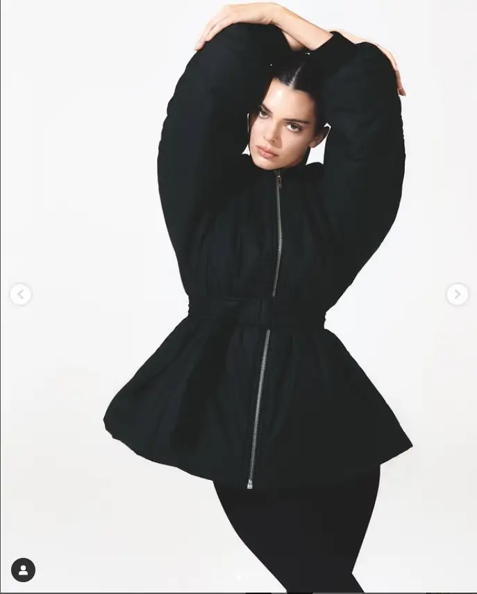 For her next outfit, Kendall opted for a more conservative look with a zip-up black jacket and matching fitted pants. 