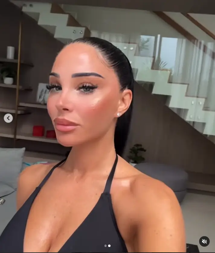 The songstress chose a chic high ponytail for her holiday clip, slicking back her beautiful raven locks. This style adds an air of sophistication and boldness to her look.