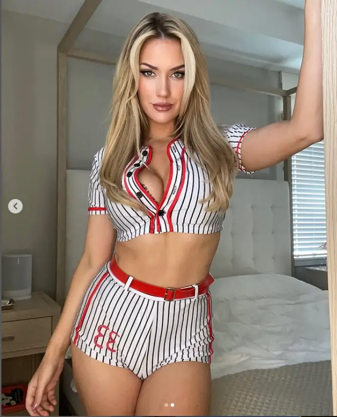 Paige Spiranac wows with a cleavage flash while going unbuttoned crop top as she showed off a mean set of abs