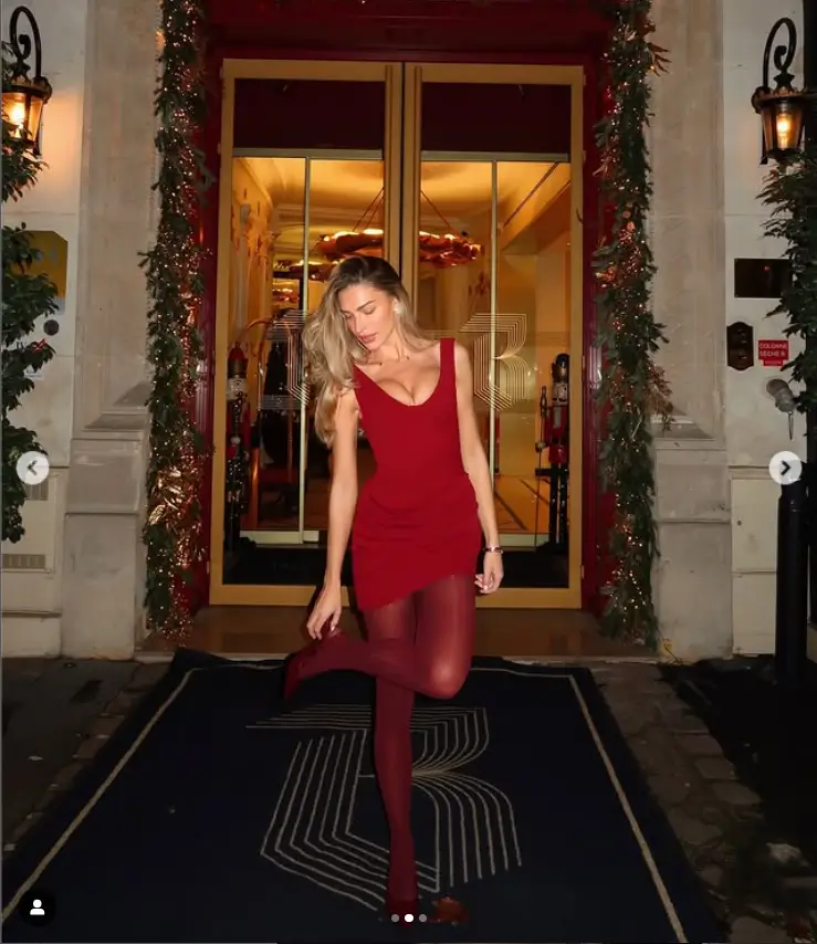 To elevate her look, Zara added a pair of gold Chanel earrings, bracelets, and necklace to her outfit. She also matched her little red dress with thick red tights and glossy single back heels for a touch of glamour.