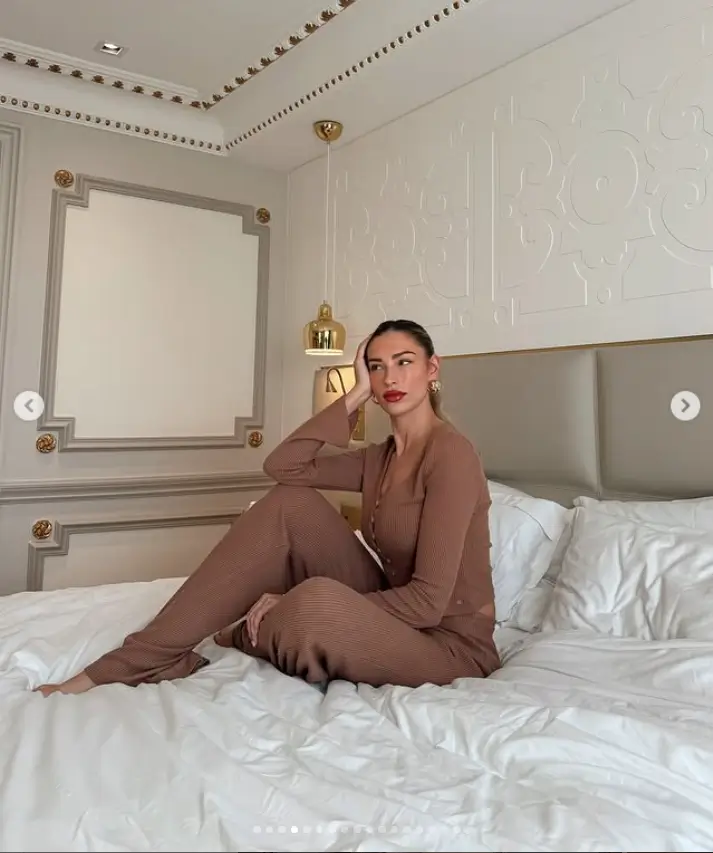 As she posed on the bed for a photoshoot, she proudly showed off the latest pieces from her fashion brand Rise. Her brown loungewear set perfectly captured the essence of comfort and style that defines her collection.