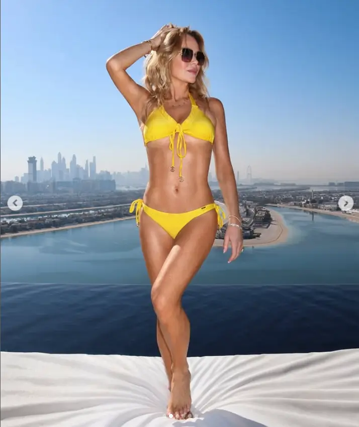 Amanda Holden is shining in the sunlight and flaunting her gorgeous figure during a lavish getaway in Dubai! At 53 years old, she stunned onlookers with her vibrant yellow bikini while striking a pose by the pool for a breathtaking Instagram photo.