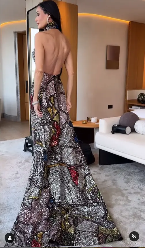 The 62-year-old actress looked stunning as she stepped out in a colorful sequin halterneck backless dress, showcasing her amazing figure. With the help of towering heels and a matching sequin clutch, she added extra height and completed her glamorous look.