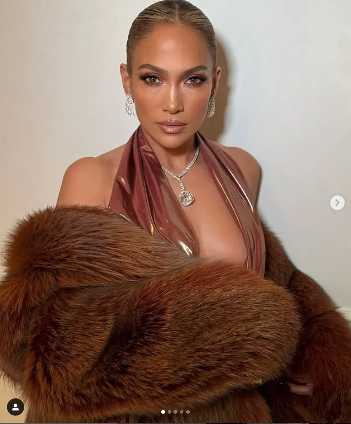 For a recent glamorous event, Jennifer Lopez stunned in a figure-hugging LaPointe gown, showcasing her fit physique. The singer and actress confidently shared her look on Instagram, leaving little to the imagination in the ultra-sexy plunging dress.