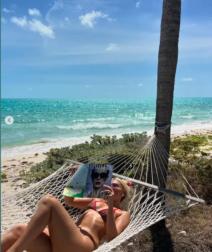 A highlight of Millie's birthday photo collection was a effortlessly chic photo of her relaxing in a hammock, casually flipping through the latest issue of Vanity Fair featuring her on the cover.